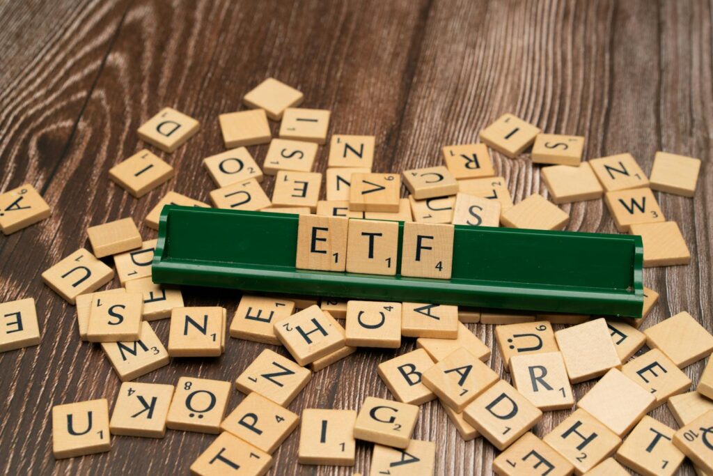 The word etf on a wooden board with scrabble tiles